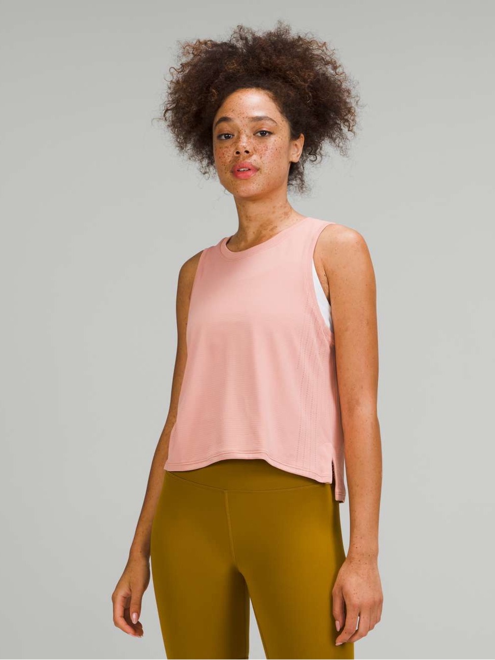 053. Lululemon Train to Be Tank pink puff